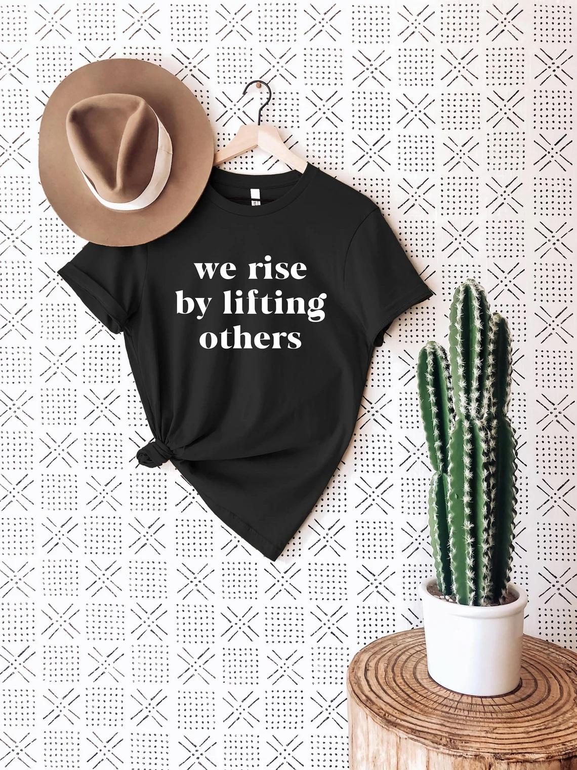 We Rise By Lifting Others T-shirt